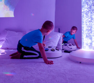 Child with ASD playing in a sensory room