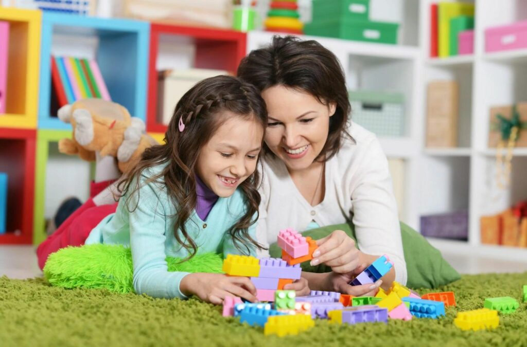 A child engaging in ABA therapy activities with a therapist in Atlanta, GA, demonstrating the benefits of personalized care.