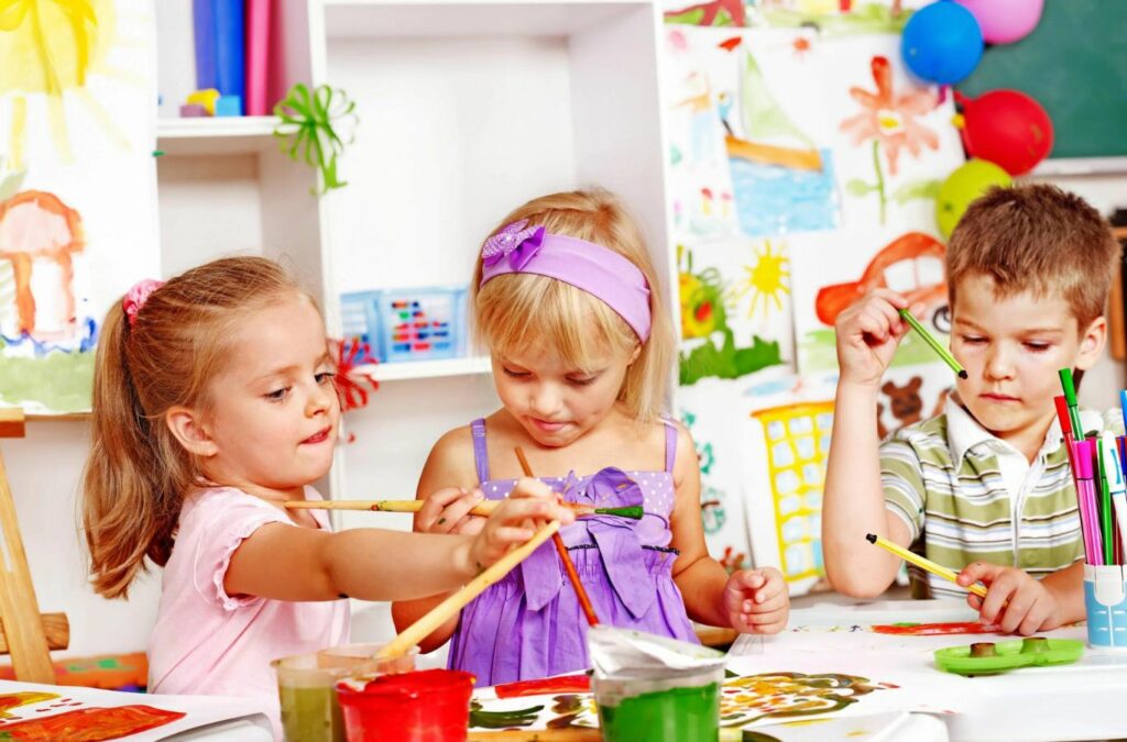 A child engaged in ABA therapy activities in College Park, GA, with a therapist from Kids Club ABA, showing the benefits of personalized care.