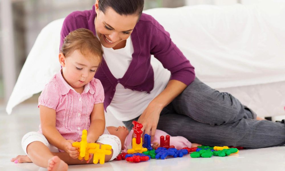 Illustration of a therapist engaging with a child during an ABA therapy session, highlighting the debunking of common misconceptions about ABA therapy in Atlanta.