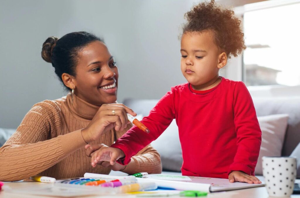 A Kids Club ABA therapist engaging in a therapy session with a child in Morrow, GA, demonstrating personalized ABA therapy techniques.