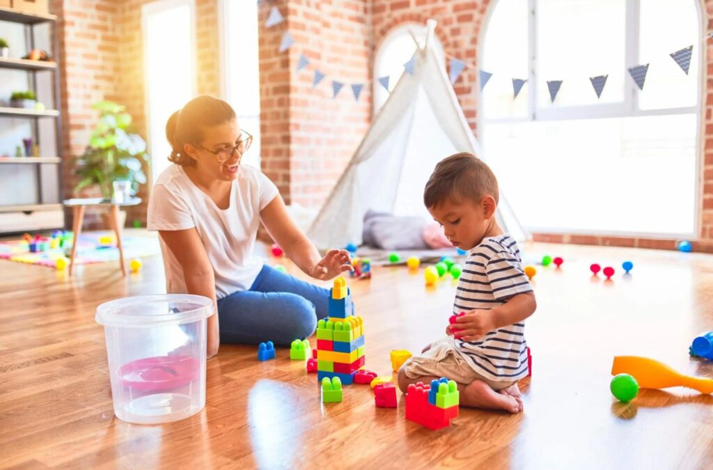 A dedicated Kids Club ABA team member providing individualized ABA therapy to a child in Garden City, GA, highlighting the advantages of our tailored approach.